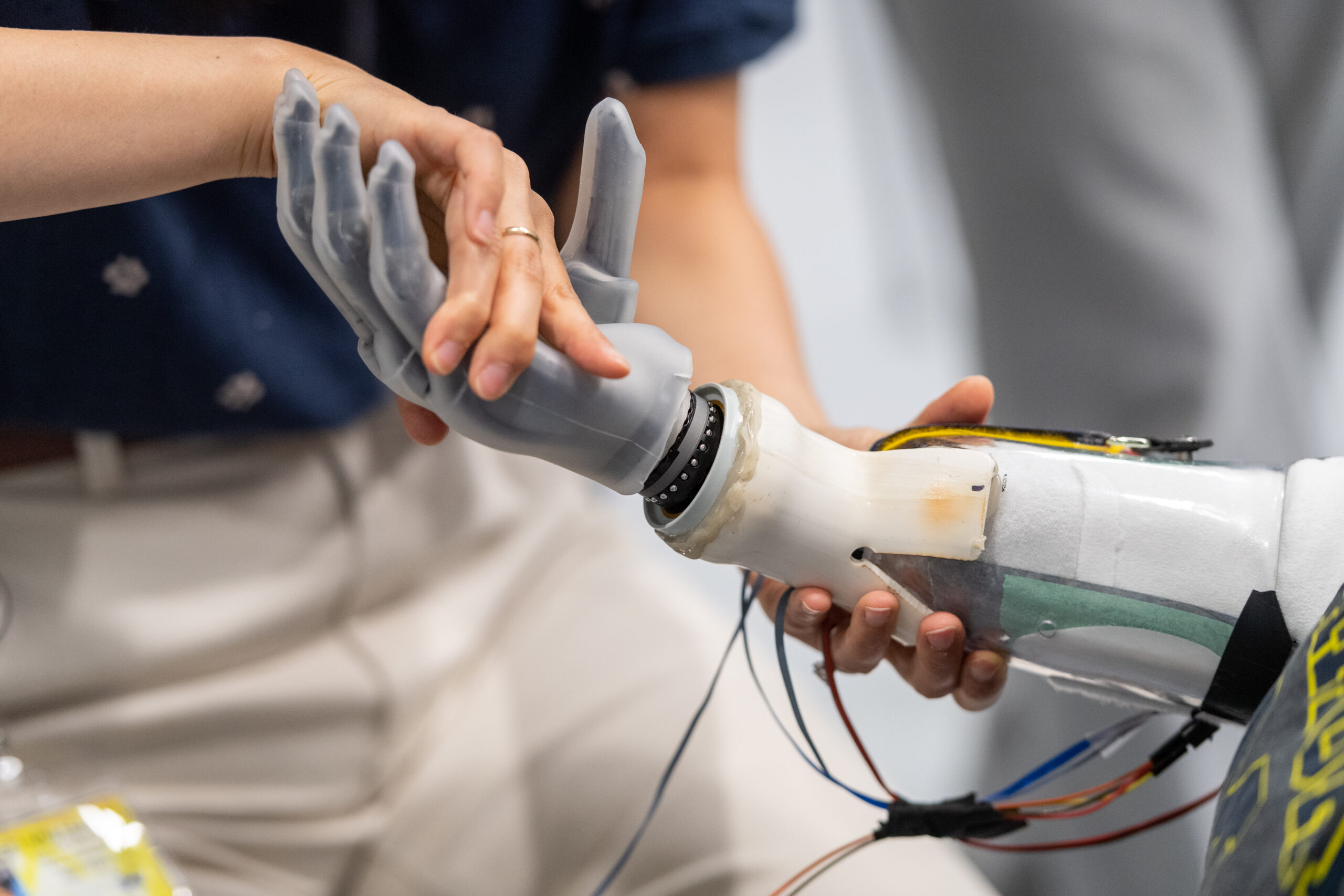 Kinesiology student tests grip of prosthetic arm
